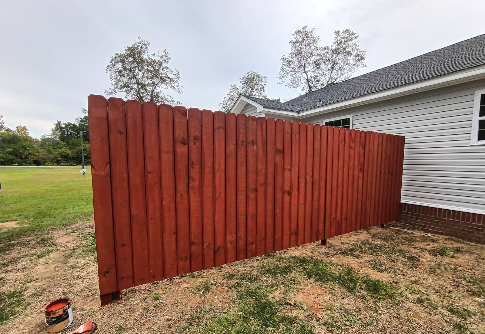 Stained wood privacy fence